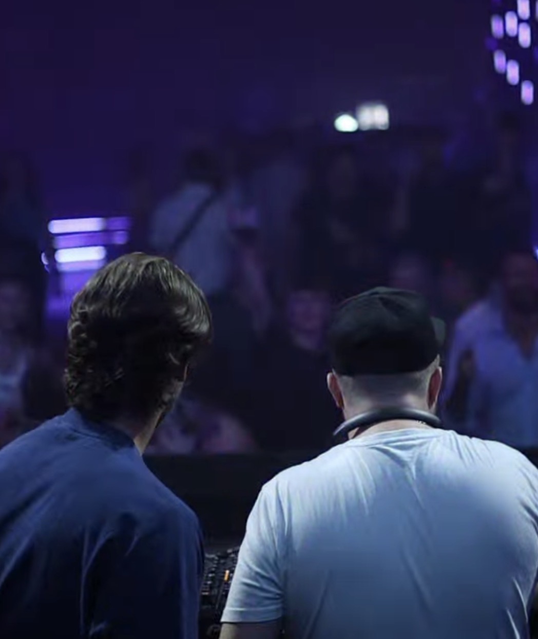 Blurred residents behind the decks